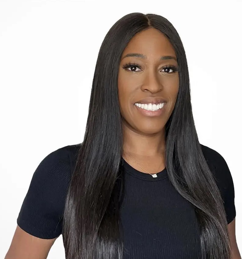 Dr. Alexzandria Washington smiling portrait in black and white